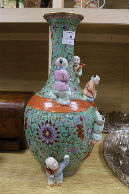 A Chinese green ground Boys vase